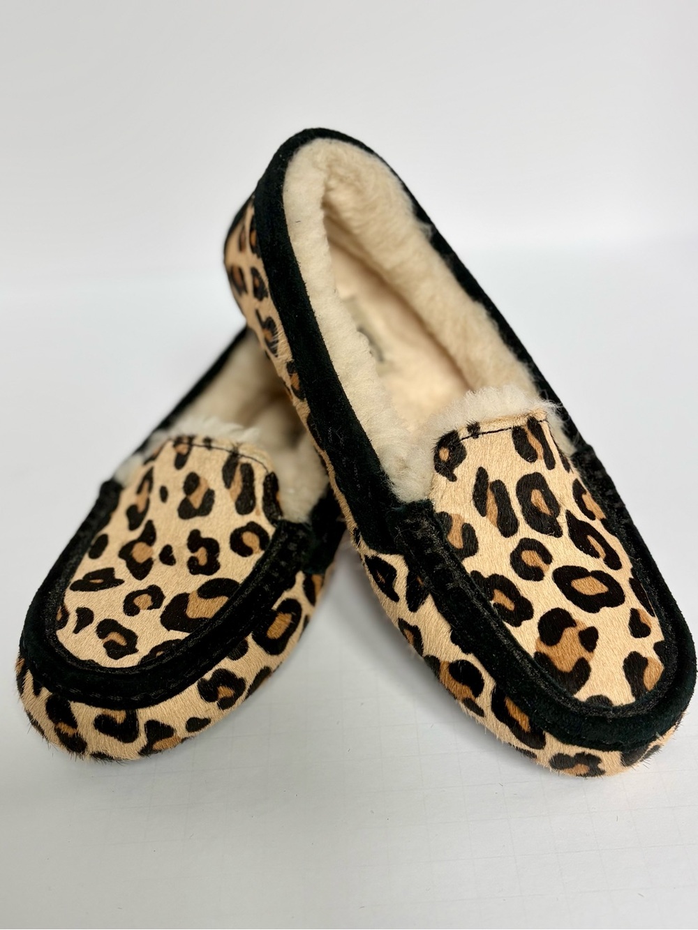 UGG Women's Leopard Print Moccasins with Black Trim and Cream Shearling Lining